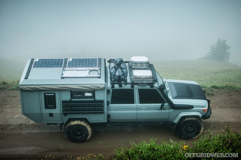 Photo of a 70-Series Toyota Land Cruiser driving through the fog.