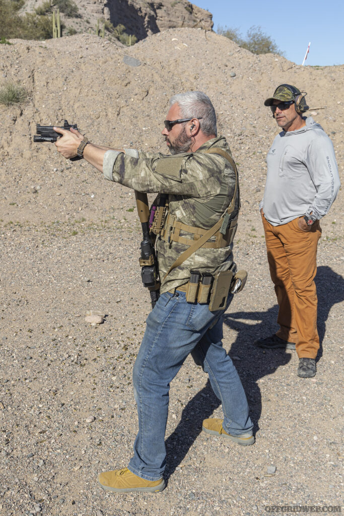 Photo of Tom Marshall practicing pistol drills at Gamut Resolutions.