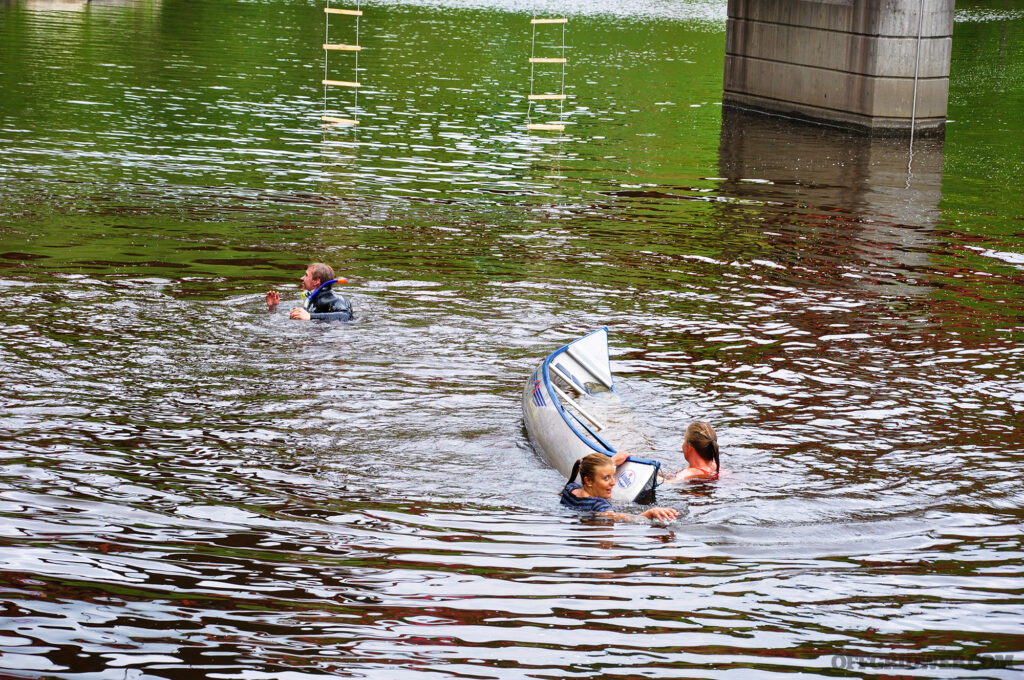 Three people treading water after their boat capsized. A sudden dunk into cold water initiates a “gasp reflex.”