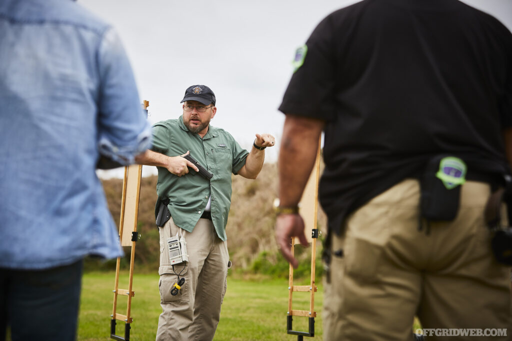 Photo of John Hearne discussing concealed carry tactics.