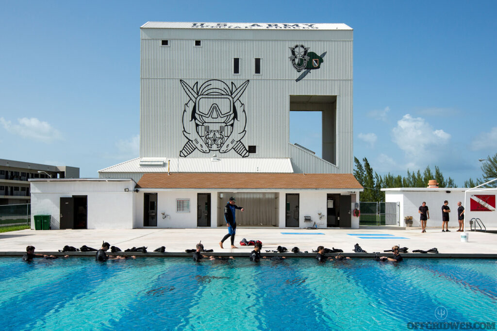 Photo of Kirk Krack teaching diving skills to members of U.S. Army Special Forces. (Photo by Craig A. Gentry)