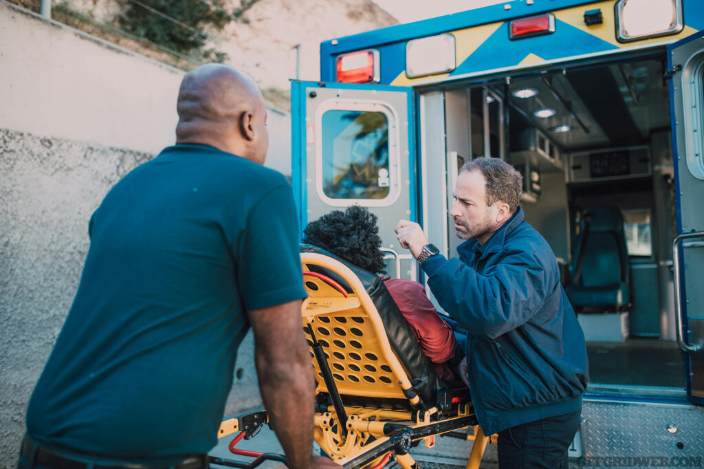 Photo of first responders tending to a patient.